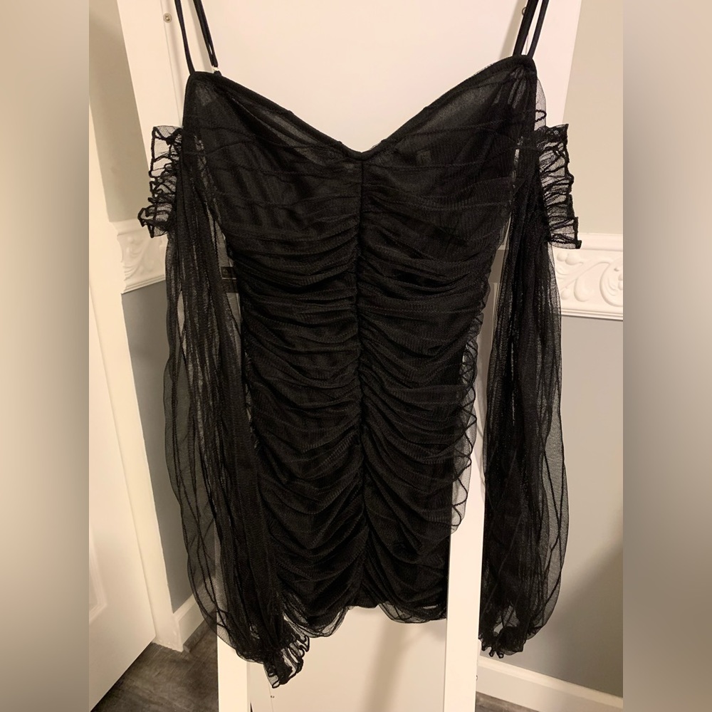 black bodycon dress with off the shoulder sleeves